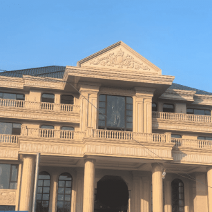 临汾黄金麻别墅外墙干挂石材效果示例