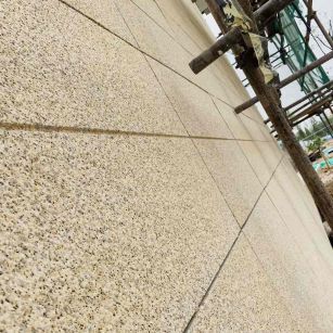 临汾 黄金麻花岗岩荔枝面外墙干挂石材效果示例