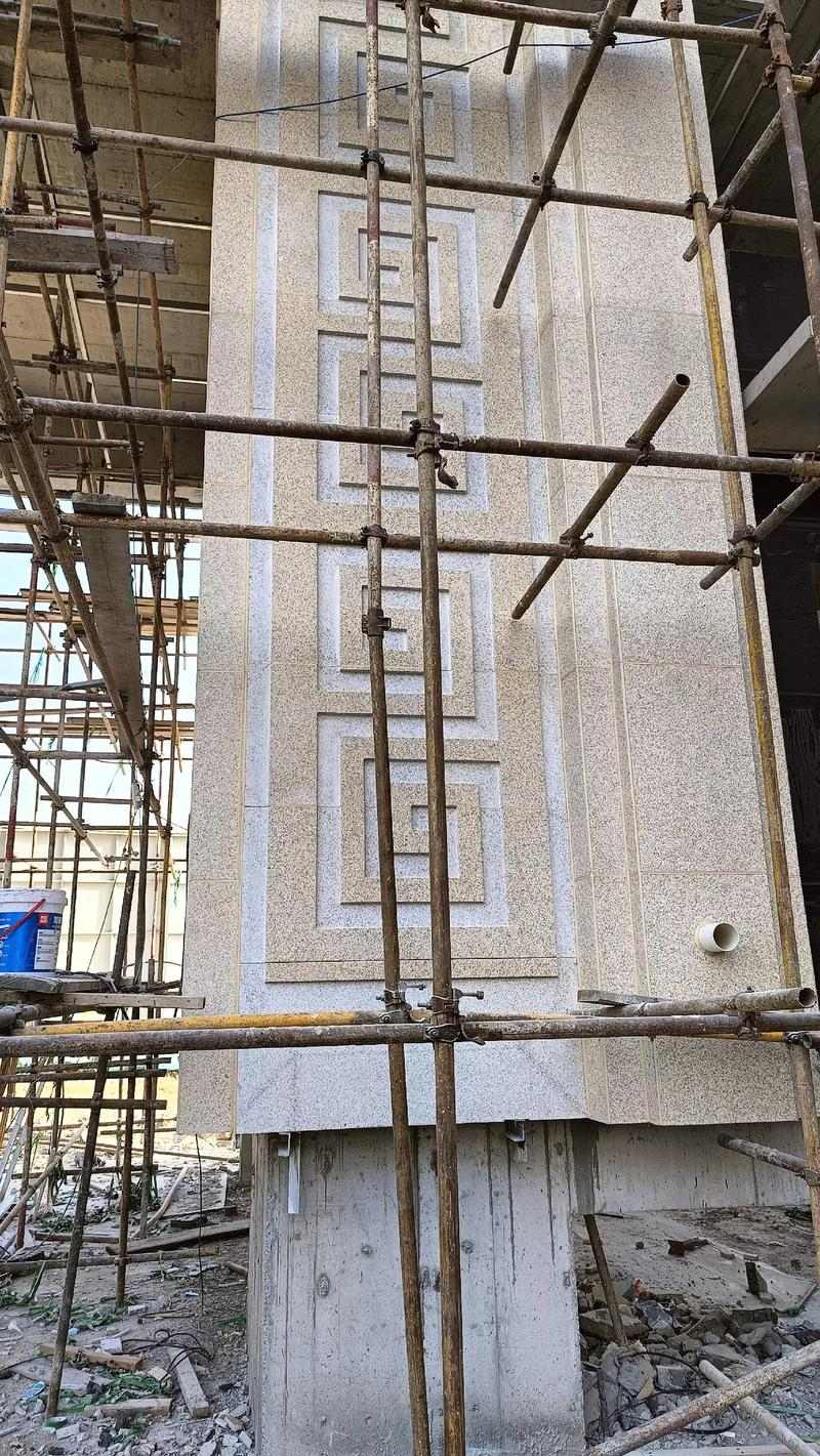 临汾 黄金麻花岗岩别墅外墙干挂回纹造型效果