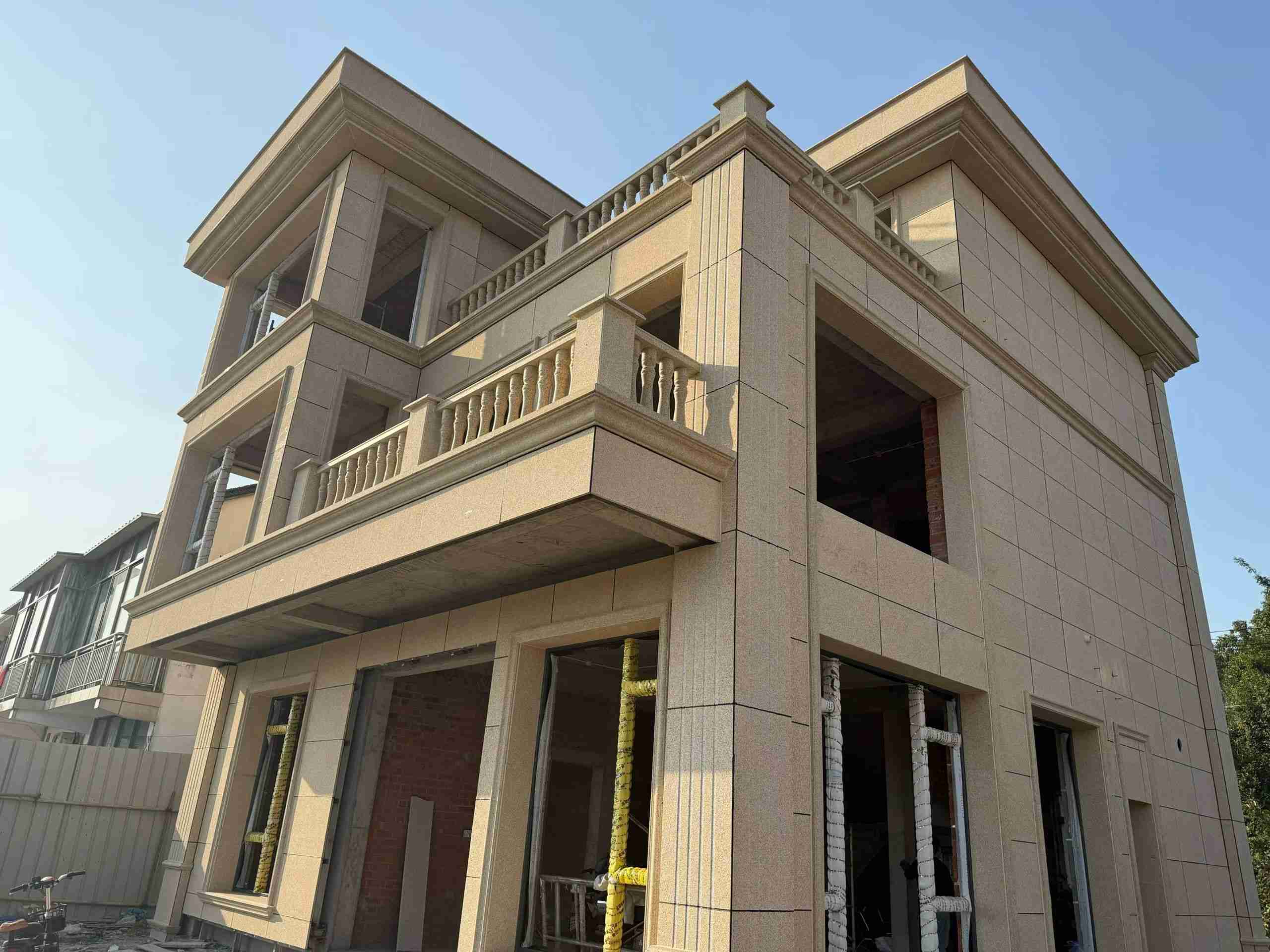 临汾 黄金麻花岗岩石材荔枝面外墙干挂效果展示