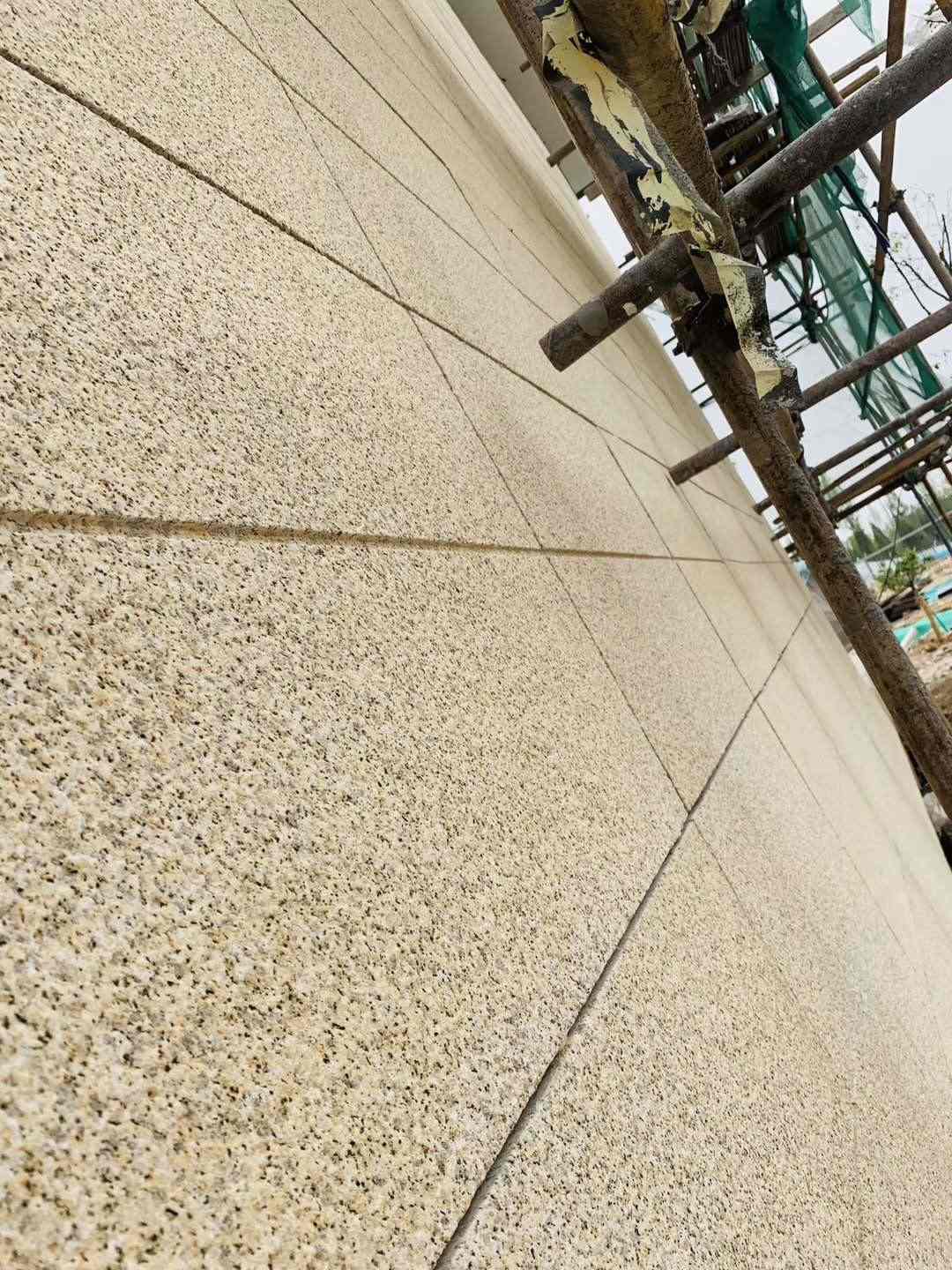 临汾 黄金麻花岗岩荔枝面外墙干挂石材效果示例